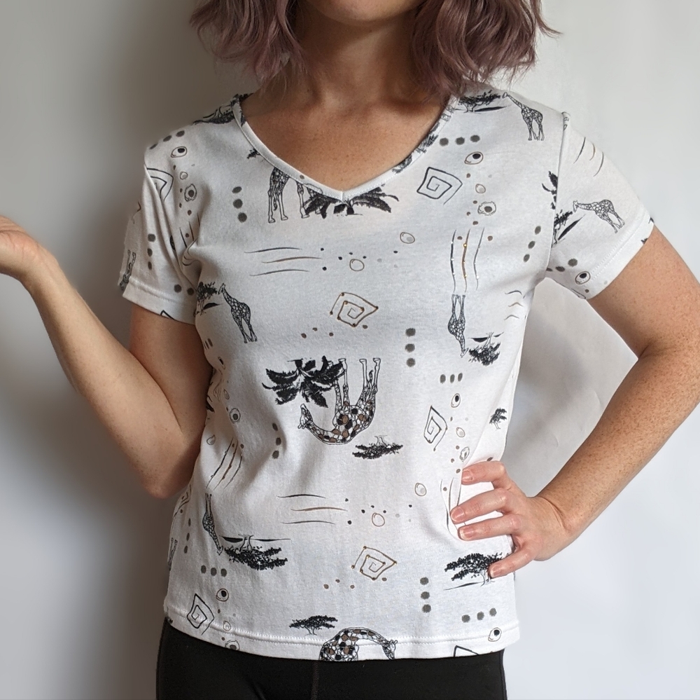 Giraffes and rhinestones on a petite medium t-shirt. Yes please